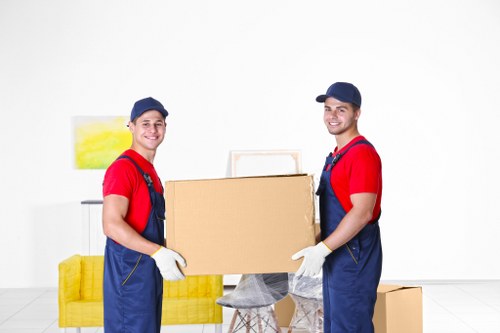 Man and van vehicle serving a residential move in Swiss Cottage