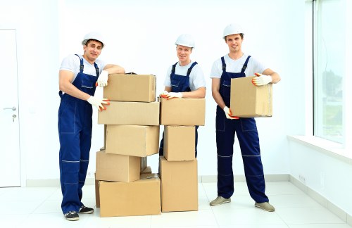 Workers preparing a van safely before a removal job