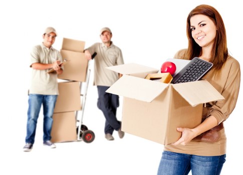 Packed boxes and furniture ready for house removals in Swiss Cottage