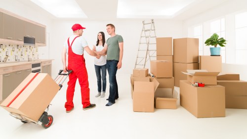 Professional movers handling a flat move near Swiss Cottage