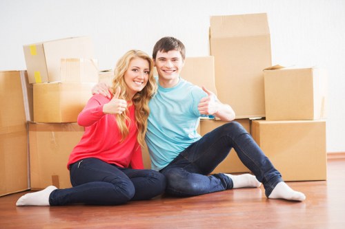 Careful loading of household belongings during a Swiss Cottage move