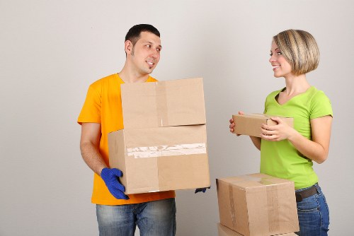 Swiss Cottage commercial move with packing crates and desks