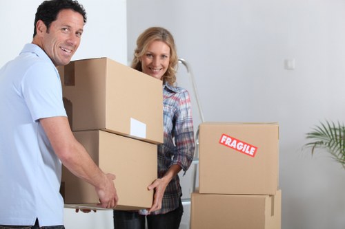 Loading furniture into a hire truck for a residential relocation